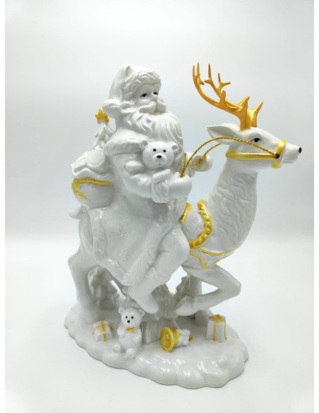 Statua natalizia Babbo Natale su cervo in ceramica bianca e oro, H 30 cm | Evviva -Evviva
